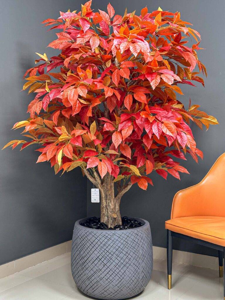 Create a cozy atmosphere with our Artificial Decorative Tree with Autumn Leaves. A striking addition that suits homes and commercial spaces perfectly!