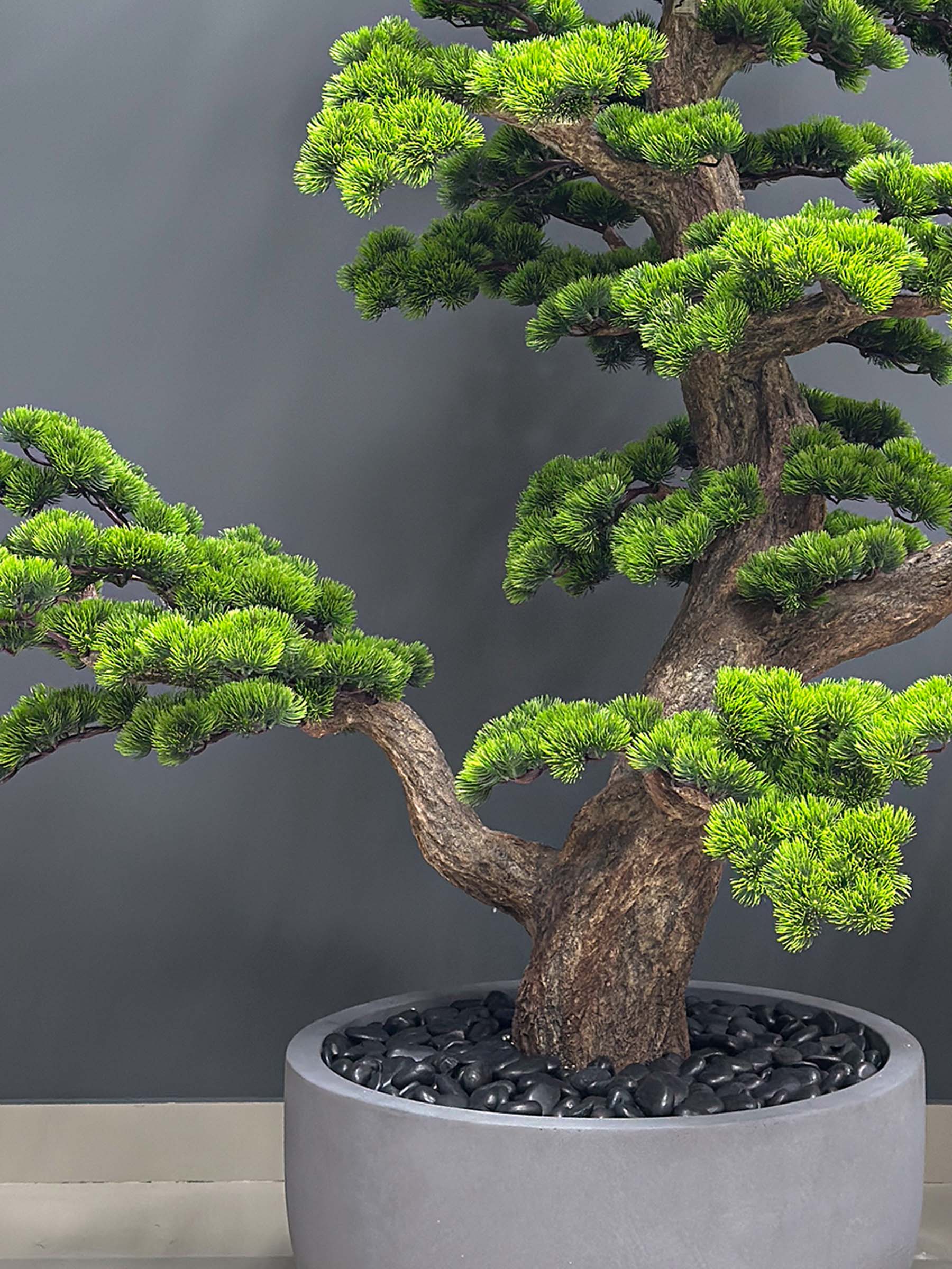 9558(2) Elevate your space with this stunning Artificial Bonsai Tree! Its realistic design and stylish pot will bring everlasting beauty to any setting.