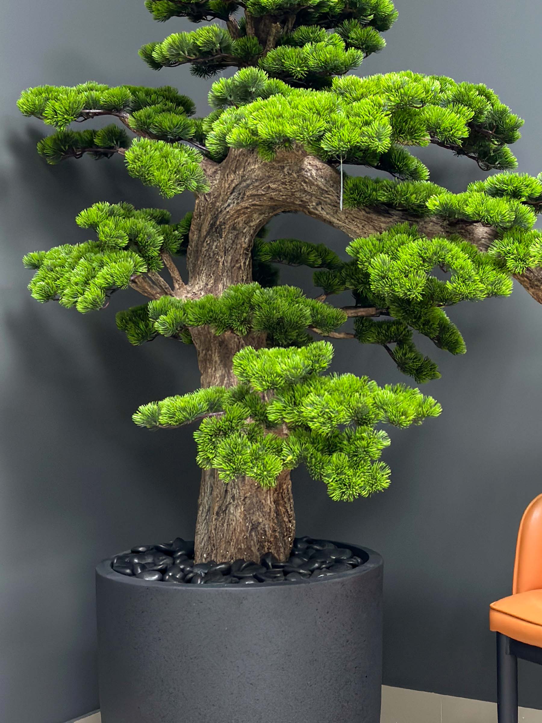 9606(2) Elevate your space with this stunning Artificial Bonsai Tree! Its realistic design and stylish pot will bring everlasting beauty to any setting.