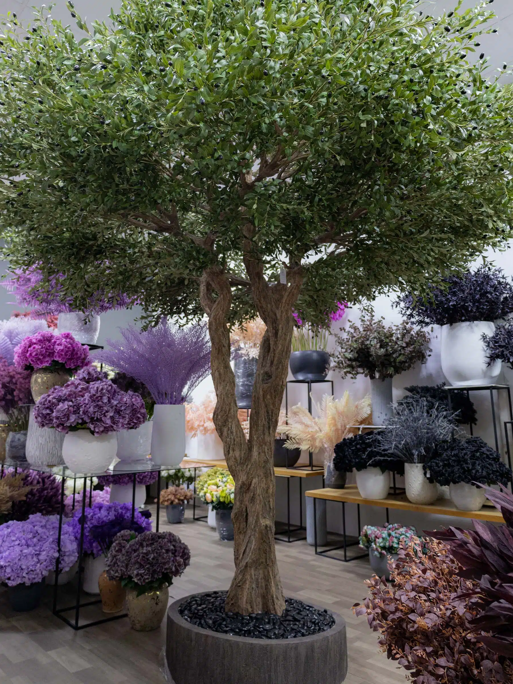 9626(2) Elevate your interior with our gorgeous Artificial Olive Tree. Enjoy the charm of nature in your home or workspace all year round!