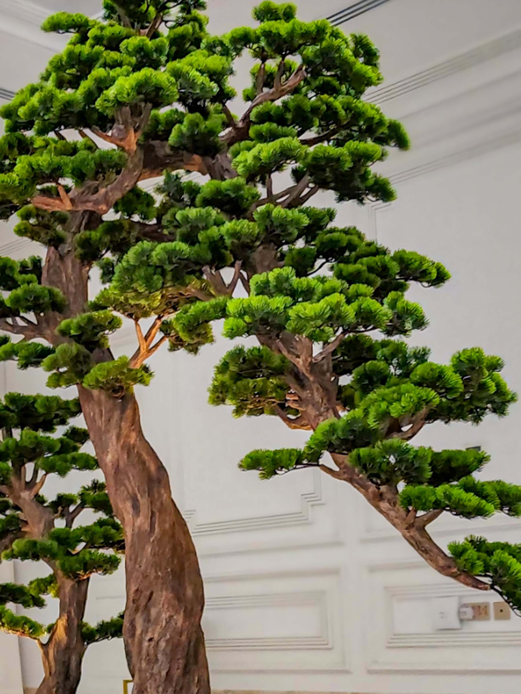 9631(2) Elevate your space with this stunning Artificial Bonsai Tree! Its realistic design and stylish pot will bring everlasting beauty to any setting.