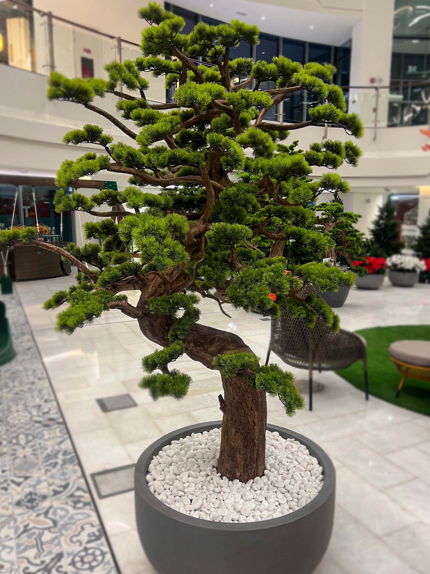 9634(2 Elevate your space with this stunning Artificial Bonsai Tree! Its realistic design and stylish pot will bring everlasting beauty to any setting.