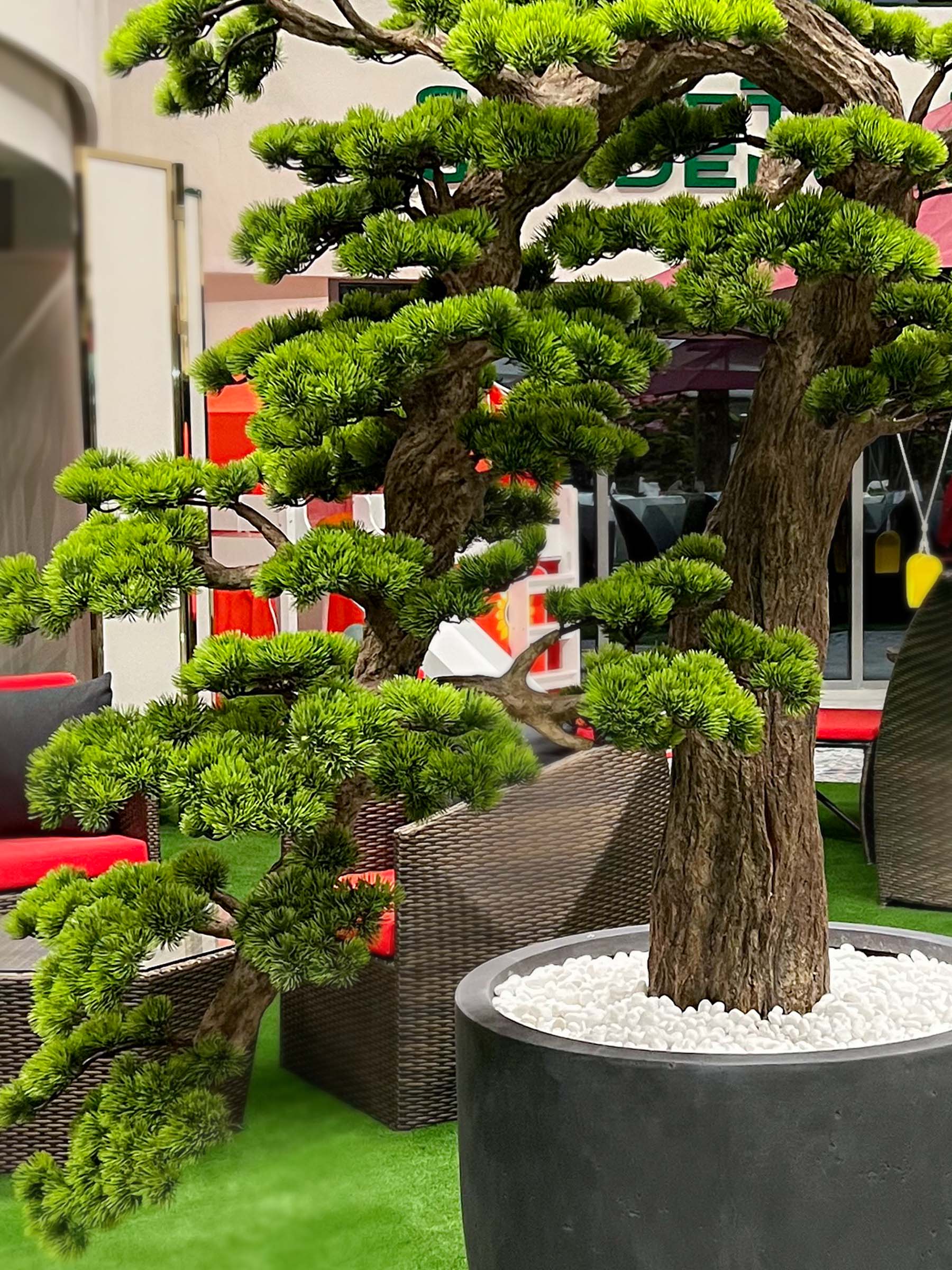 9647(2) Elevate your space with this stunning Artificial Bonsai Tree! Its realistic design and stylish pot will bring everlasting beauty to any setting.