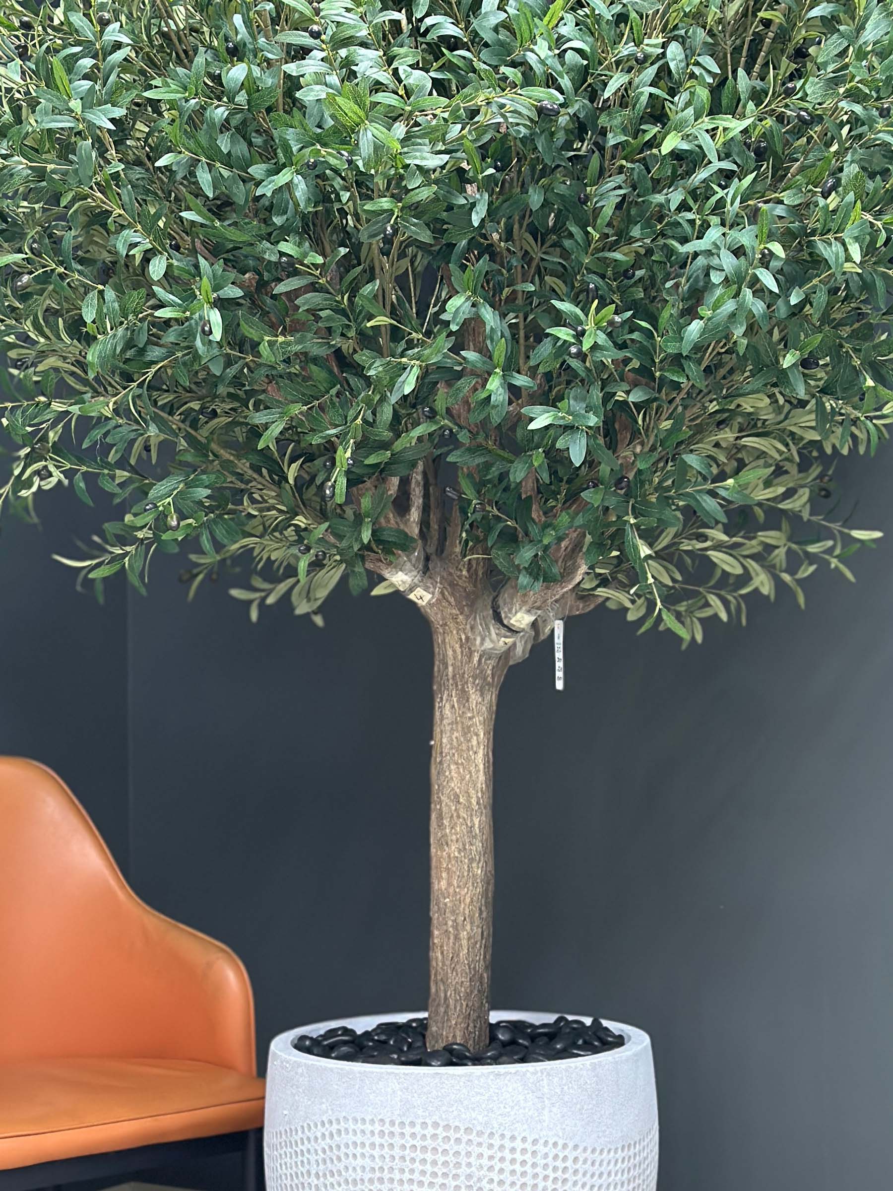 9361(1) Elevate your interior with our gorgeous Artificial Olive Tree. Enjoy the charm of nature in your home or workspace all year round!