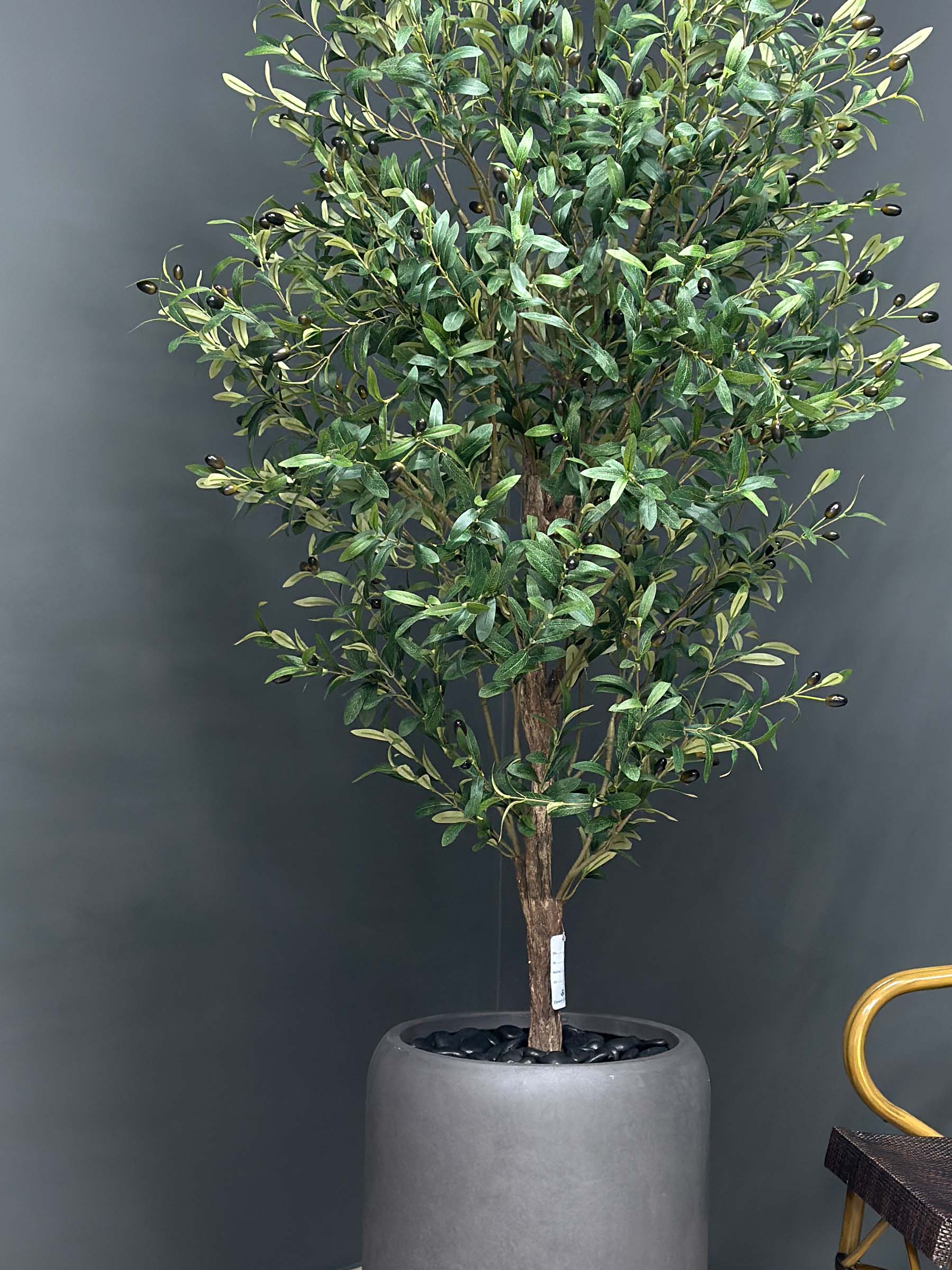 Elevate your interior with our gorgeous Artificial Olive Tree. Enjoy the charm of nature in your home or workspace all year round!