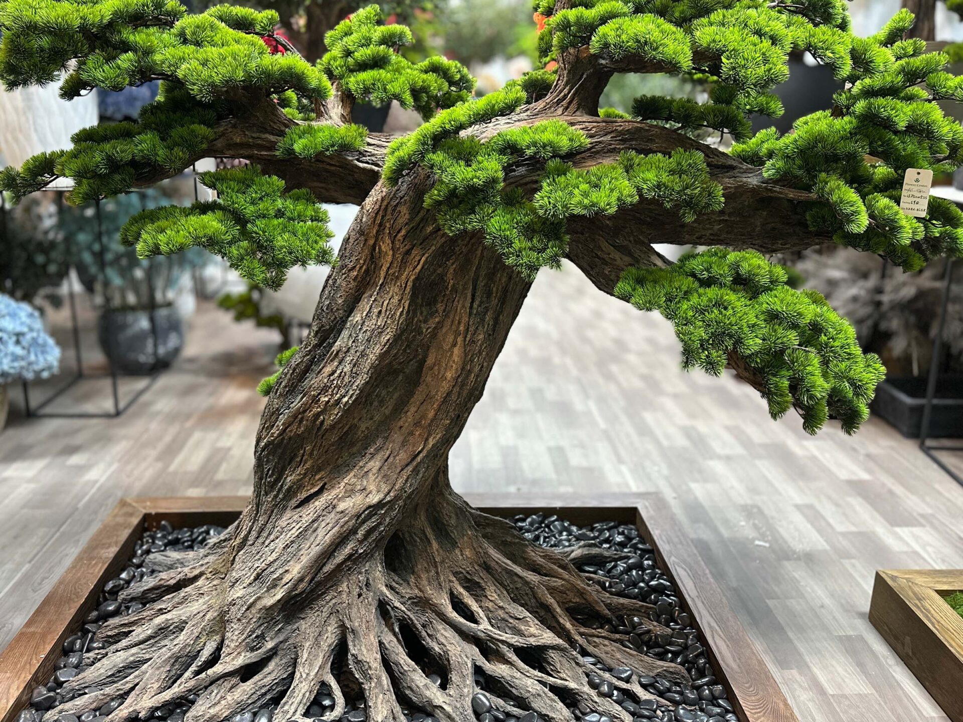 9720.(1)jpg Elevate your space with this stunning Artificial Bonsai Tree! Its realistic design and stylish pot will bring everlasting beauty to any setting.