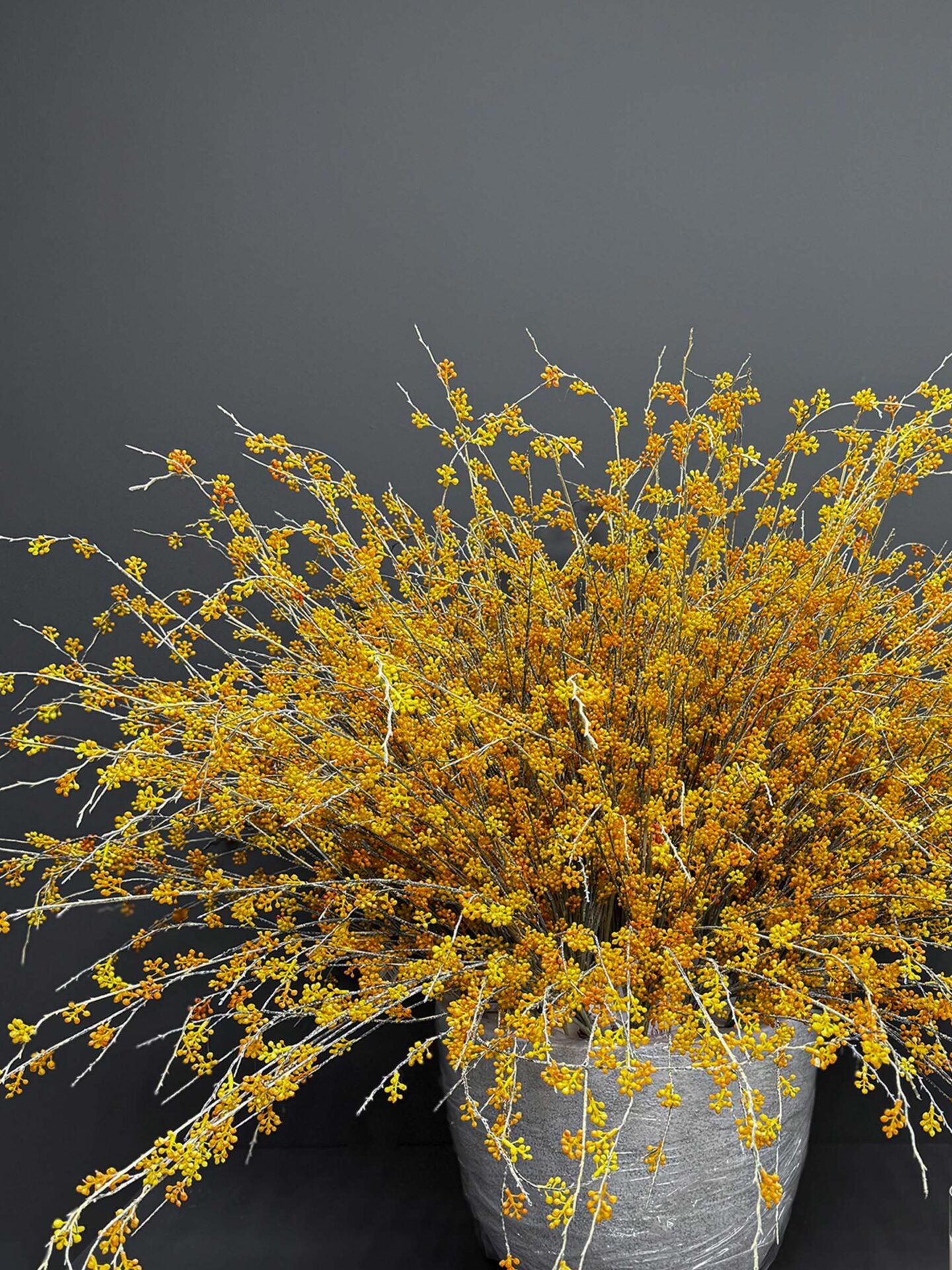 ar49-1 Add a touch of elegance to your space with the Artificial Accessories Golden - Grey Pot. Embrace everlasting beauty that requires no care!