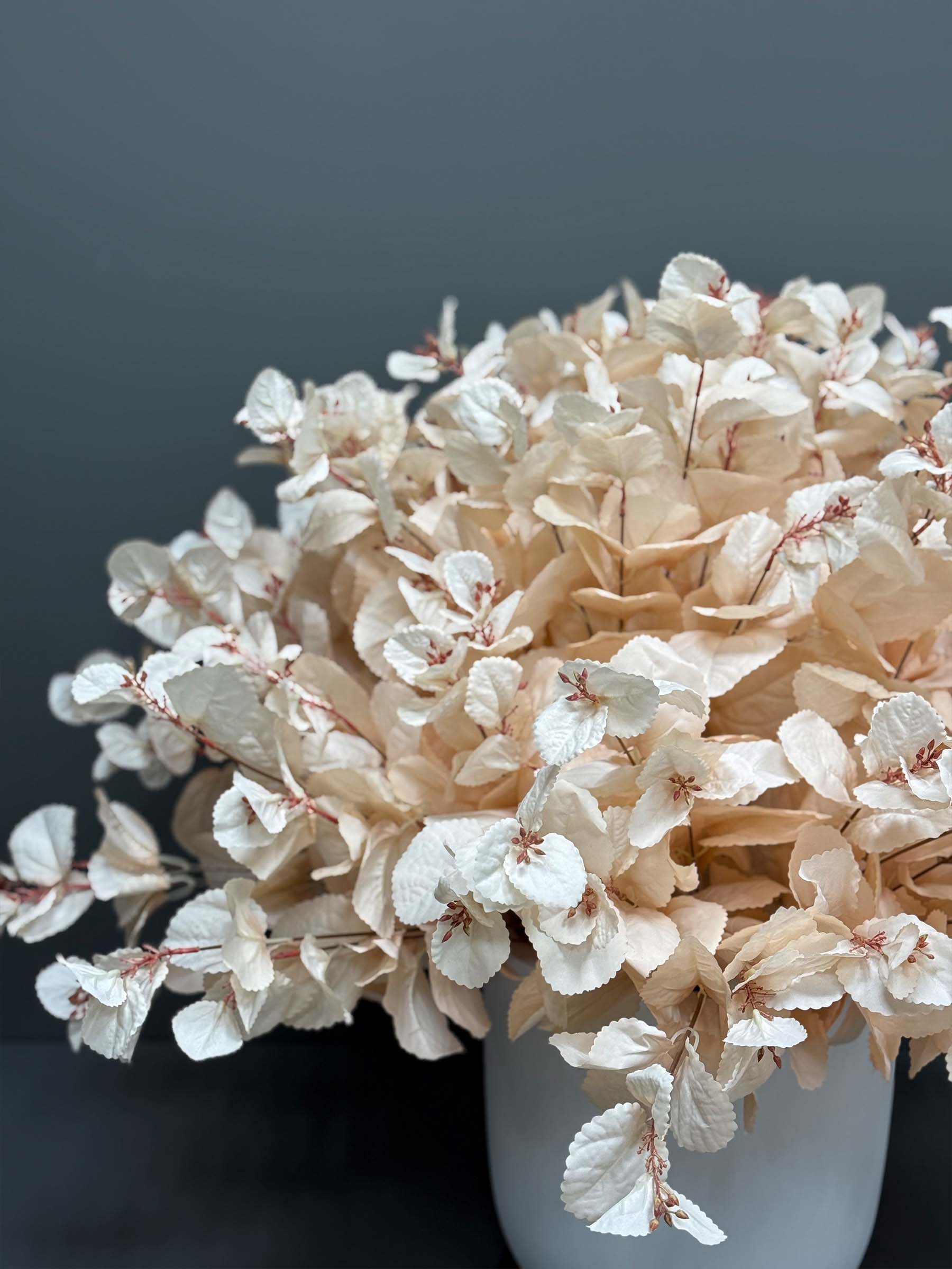 ar53-1 Add a touch of elegance to your space with the Artificial Accessories Golden - Grey Pot. Embrace everlasting beauty that requires no care!